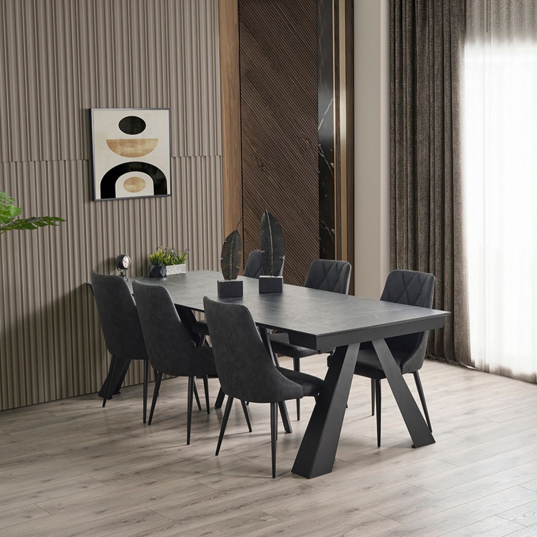 Трапезна маса Mounta в компактно състояние до стена, показана като изчистена и стилна маса за малки пространства.