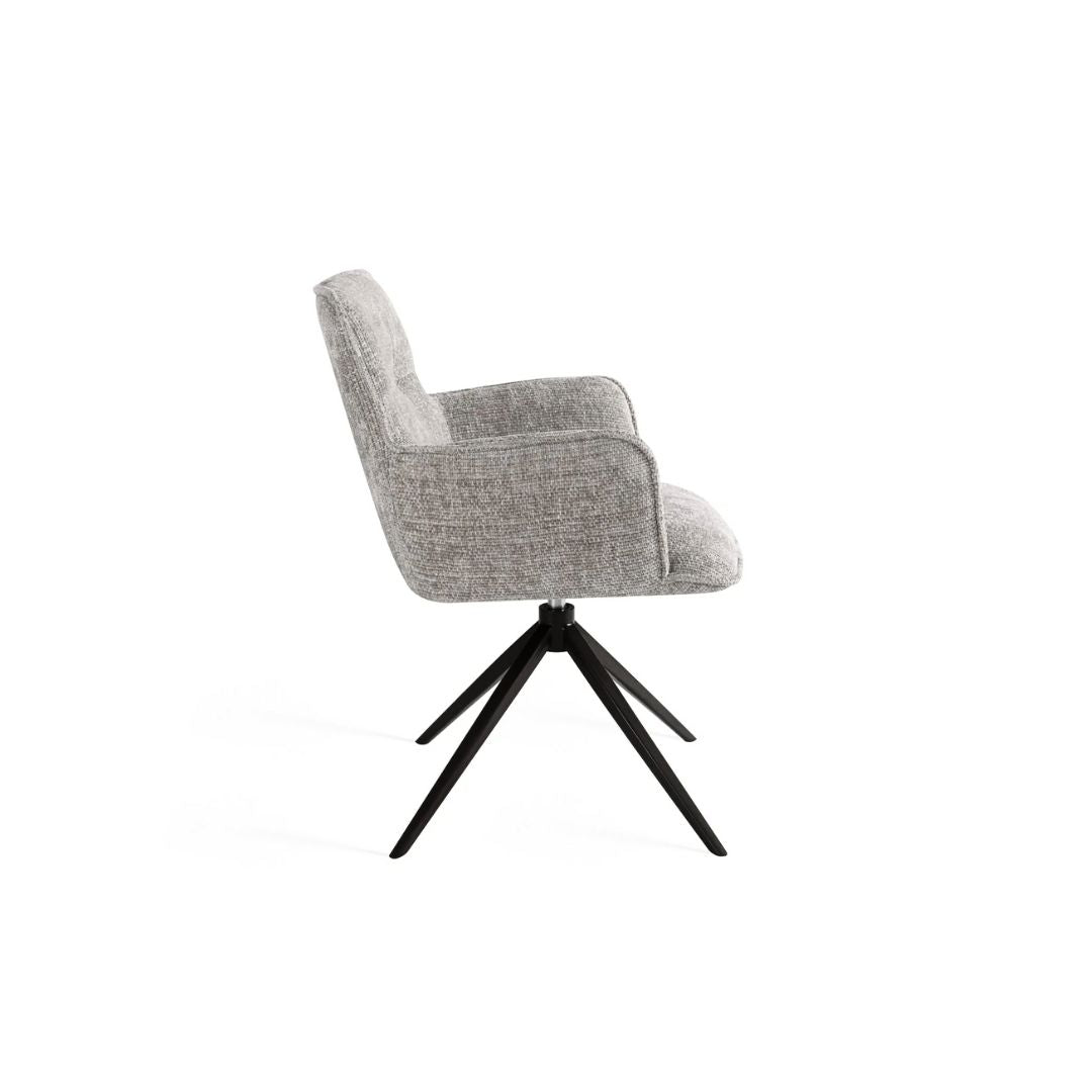 Стол Y-73 Gray, разположен до трапезна маса, използван като стол за хранене в модерна трапезария.