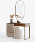 a dressing table with a mirror and a stool