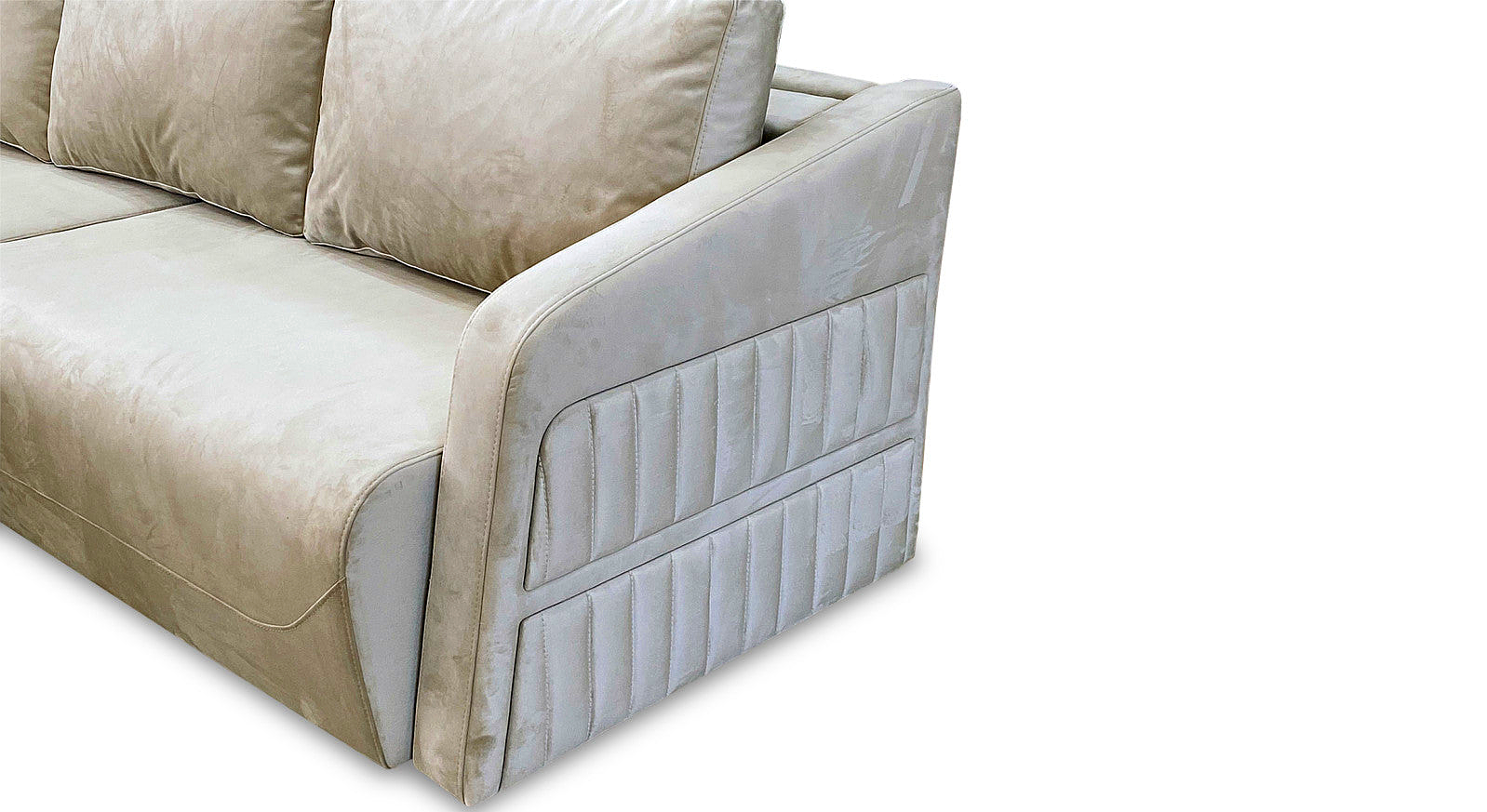 a white couch with two pillows on top of it