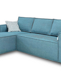 a blue couch with pillows on top of it