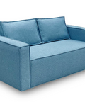 a blue couch with three pillows on it